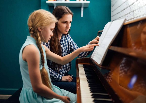 Comment apprendre à jouer facilement du piano avec un enfant ?
